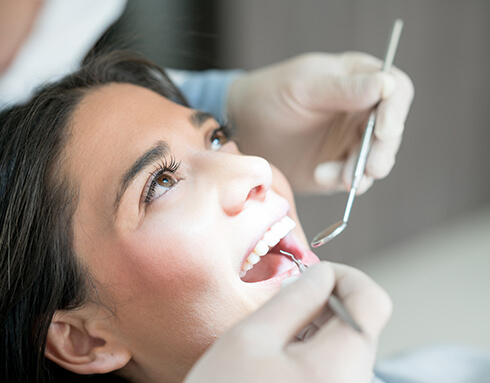 dental patient receiving a cleaning